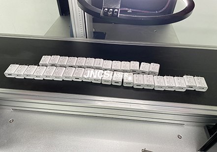 UV laser marking machines for mobile phone charging head application